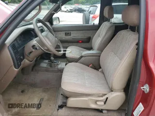 1999 Toyota Tacoma z VIN 4TAWN72N1XZ484114, wystawiony jako Copart lot #60478265 z przebiegiem 209 308 mil mil oraz Szkoda całkowita • Salvage title. Historia ofert i sprzedaży dostępna na DreamBid. Obrazek 7.