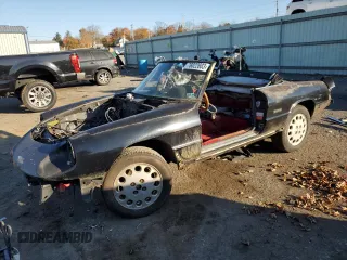 1988 Alfa Romeo Spider z VIN ZARBC5707J1059230, wystawiony jako Copart lot #68257004 z przebiegiem 113 985 mil mil oraz Szkoda całkowita • Salvage title. Historia ofert i sprzedaży dostępna na DreamBid. Obrazek 1.