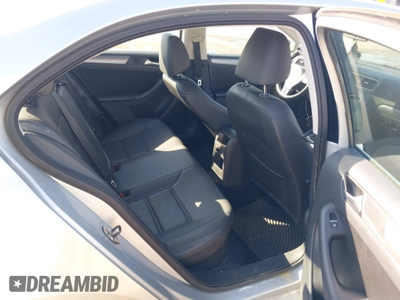 2014 Volkswagen Jetta TDI w/Premium with VIN 3VWLL7AJ2EM359341, listed as a IAAI auction lot 42030959 with 74,273 mi miles and . Bid and sale history available at DreamBid. Image 8.