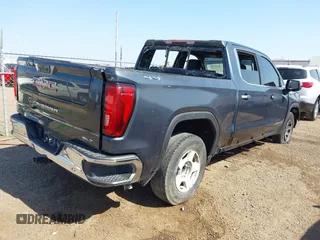 2021 GMC Sierra 1500 SLT z VIN 3GTU9DED4MG127507, wystawiony jako IAAI lot #42266491 z przebiegiem 329 391 mil mil oraz . Historia ofert i sprzedaży dostępna na DreamBid. Obrazek 4.
