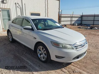 2012 Ford Taurus SEL with VIN 1FAHP2EW9CG134398, listed as a IAAI auction lot 41998130 with 158,141 mi miles and . Bid and sale history available at carsss.com. Image 1.