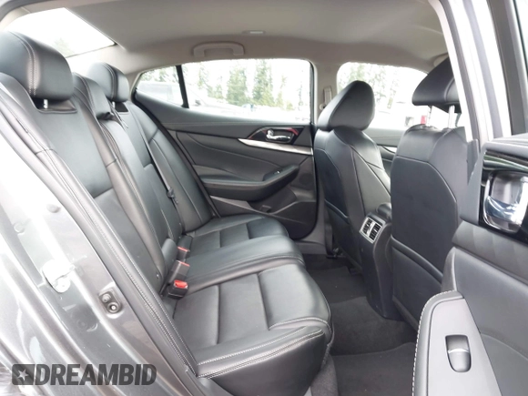 2023 Nissan Maxima SV with VIN 1N4AA6CV4PC512497, listed as a IAAI auction lot 41760990 with 32,400 mi miles and . Bid and sale history available at DreamBid. Image 8.