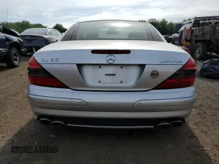 2005 Mercedes-Benz SL z VIN WDBSK79F05F094158, wystawiony jako Copart lot #60888905 z przebiegiem Nie podano mil oraz Szkoda całkowita • Salvage title. Historia ofert i sprzedaży dostępna na DreamBid. Obrazek 6.