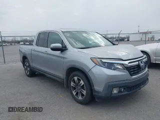 2019 Honda Ridgeline RTL z VIN 5FPYK2F50KB004055, wystawiony jako IAAI lot #41576975 z przebiegiem 128 620 mil mil oraz . Historia ofert i sprzedaży dostępna na DreamBid. Obrazek 1.