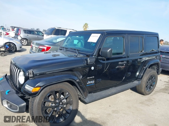 2023 Jeep Wrangler Sahara with VIN 1C4JJXP67PW556933, listed as a IAAI auction lot 41587035 with 20,463 mi miles and . Bid and sale history available at DreamBid. Image 14.