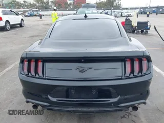 2021 Ford Mustang EcoBoost z VIN 1FA6P8TH7M5115490, wystawiony jako IAAI lot #42428724 z przebiegiem 47 417 mil mil oraz . Historia ofert i sprzedaży dostępna na DreamBid. Obrazek 16.