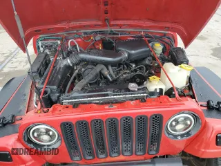 2000 Jeep Wrangler SE with VIN 1J4FA29P6YP793045, listed as a Copart auction lot 58756715 with 202,110 mi miles and Salvage title. Bid and sale history available at DreamBid. Image 11.