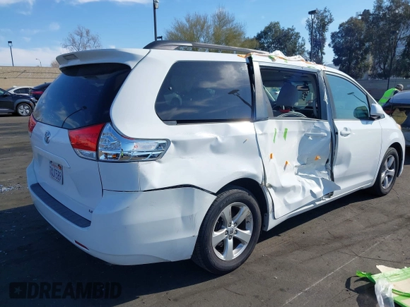 2012 Toyota Sienna LE AAS with VIN 5TDKK3DCXCS276325, listed as a IAAI auction lot 41791385 with 133,635 mi miles. Bid and sale history available at carsss.com. Image 12.