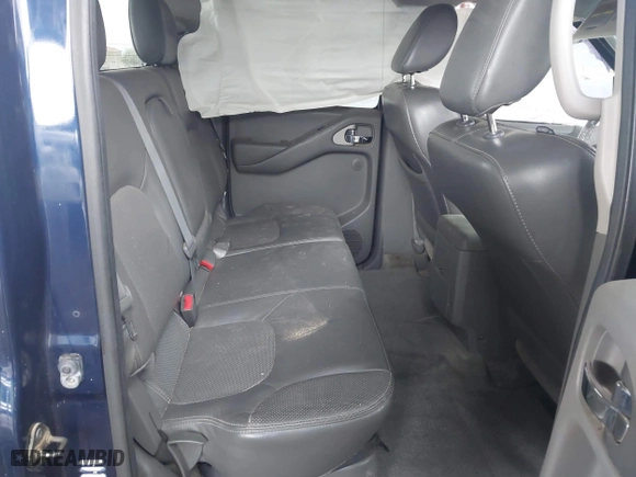 2011 Nissan Frontier PRO-4X with VIN 1N6AD0EV7BC426151, listed as a IAAI auction lot 41751873 with 152,464 mi miles. Bid and sale history available at carsss.com. Image 8.