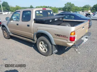 2002 Toyota Tacoma with VIN 5TEHN72NX2Z885767, listed as a IAAI auction lot 42643995 with 308,492 mi miles and . Bid and sale history available at DreamBid. Image 3.