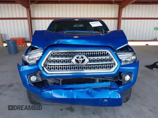 2017 Toyota Tacoma SR5 with VIN 3TMBZ5DN1HM009204, listed as a IAAI auction lot 41301765 with 129,923 mi miles and . Bid and sale history available at DreamBid. Image 12.