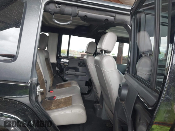 2008 Jeep Wrangler Unlimited Sahara with VIN 1J8GA59128L542384, listed as a IAAI auction lot 42184176 with 152,768 mi miles and . Bid and sale history available at DreamBid. Image 8.