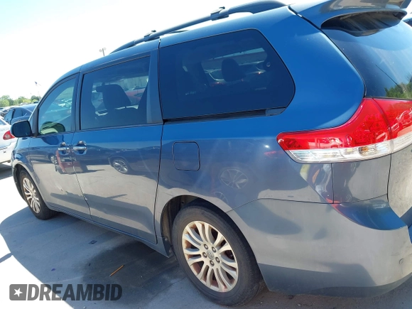 2014 Toyota Sienna XLE with VIN 5TDYK3DC5ES481399, listed as a IAAI auction lot 42085550 with 154,157 mi miles. Bid and sale history available at carsss.com. Image 14.