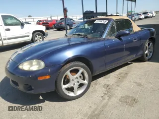 2002 Mazda MX-5 Miata Cloth z VIN JM1NB353220222868, wystawiony jako Copart lot #59944345 z przebiegiem 159 595 mil mil oraz Szkoda całkowita • Salvage title. Historia ofert i sprzedaży dostępna na DreamBid. Obrazek 1.