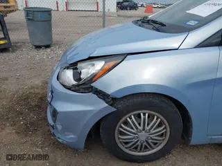 2014 Hyundai Accent GS with VIN KMHCT5AE1EU147015, listed as a IAAI auction lot 41659497 with 147,832 mi miles. Bid and sale history available at carsss.com. Image 12.