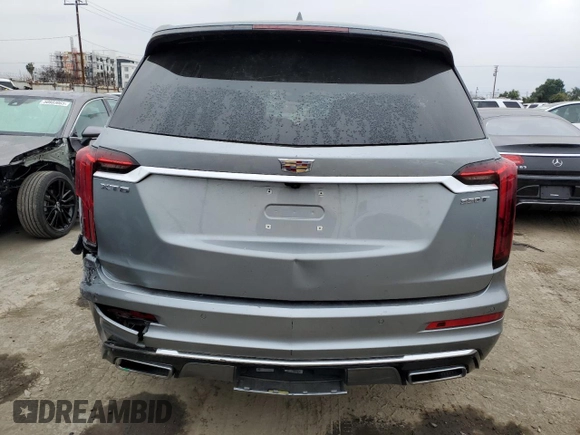2023 Cadillac XT6 FWD Luxury z VIN 1GYKPAR47PZ147139, wystawiony jako Copart lot #50783595 z przebiegiem 27 684 mil mil oraz Szkoda całkowita • Salvage title. Historia ofert i sprzedaży dostępna na DreamBid. Obrazek 6.