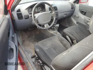 2005 Hyundai Accent GLS с VIN KMHCG35C45U359201, выставлен на аукционе Copart как лот 49072705 с пробегом 93 299 миль миль и На запчасти • Non repairable. История ставок и продаж доступна на DreamBid. Изображение 8.