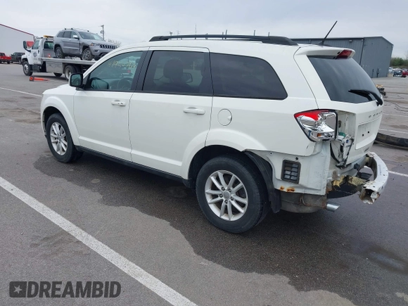 2013 Dodge Journey SXT with VIN 3C4PDCBG9DT564303, listed as a IAAI auction lot 41954764 with 132,125 mi miles. Bid and sale history available at carsss.com. Image 3.