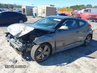 2015 Hyundai Veloster Turbo with VIN KMHTC6AE8FU229198, listed as a IAAI auction lot 41596345 with 74,943 mi miles. Bid and sale history available at carsss.com. Image 17.
