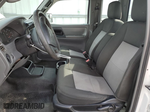 2010 Ford Ranger with VIN 1FTLR1EE1APA37032, listed as a Copart auction lot 82587614 with 215,440 mi miles and Salvage Title. Bid and sale history available at DreamBid. Image 7.