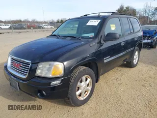 2006 GMC Envoy SLT with VIN 1GKDS13SX62260454, listed as a IAAI auction lot 41479478 with 255,019 mi miles. Bid and sale history available at carsss.com. Image 2.