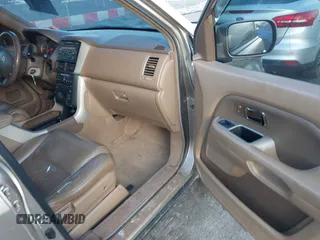 2007 Honda Pilot EX-L with VIN 2HKYF18667H509331, listed as a IAAI auction lot 41453510 with 228,746 mi miles and . Bid and sale history available at DreamBid. Image 5.