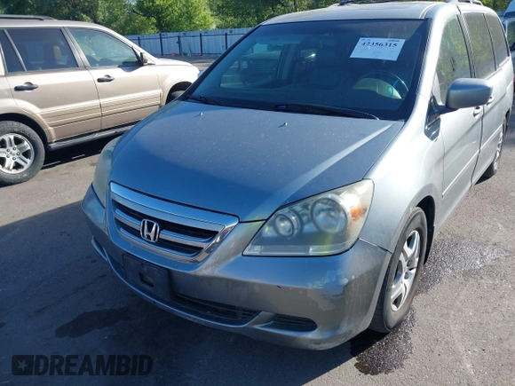 2006 Honda Odyssey EX-L z VIN 5FNRL38766B102432, wystawiony jako IAAI lot #42356315 z przebiegiem 214 261 mil mil oraz . Historia ofert i sprzedaży dostępna na DreamBid. Obrazek 6.