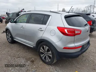 2013 Kia Sportage EX with VIN KNDPCCA22D7484936, listed as a IAAI auction lot 41921531 with 128,001 mi miles and . Bid and sale history available at DreamBid. Image 3.