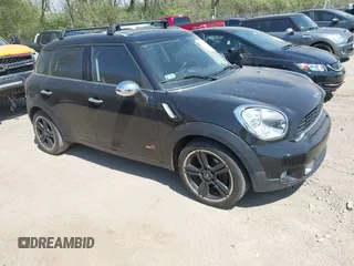 2011 MINI Countryman S with VIN WMWZC5C50BWL53922, listed as a IAAI auction lot 42069410 with 66,797 mi miles and . Bid and sale history available at DreamBid. Image 1.