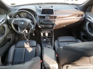 2018 BMW X1 xDrive28i with VIN WBXHT3C33J5F90612, listed as a Copart auction lot 74937654 with 72,561 mi miles and Salvage Title. Bid and sale history available at carsss.com. Image 8.