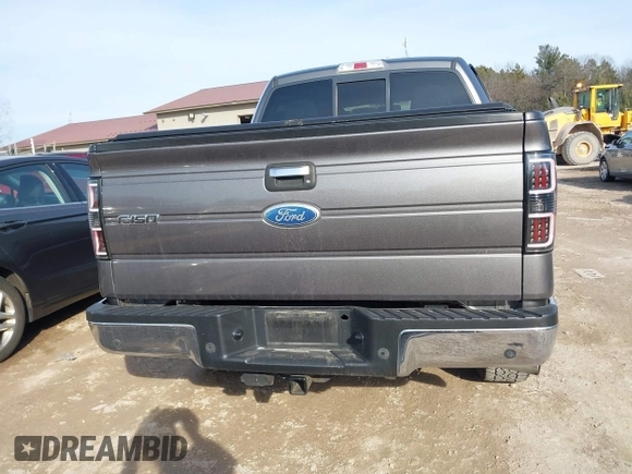 2011 Ford F-150 XLT with VIN 1FTFW1ET7BFC47792, listed as a IAAI auction lot 41765574 with 174,001 mi miles. Bid and sale history available at carsss.com. Image 16.