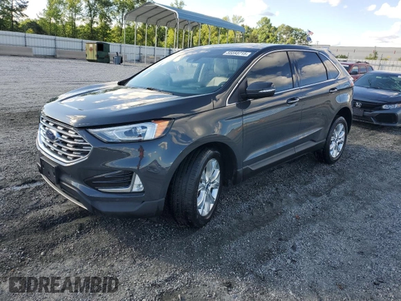 2021 Ford Edge Titanium z VIN 2FMPK3K96MBA54764, wystawiony jako Copart lot #55593715 z przebiegiem 49 729 mil mil oraz Szkoda całkowita • Salvage title. Historia ofert i sprzedaży dostępna na DreamBid. Obrazek 1.
