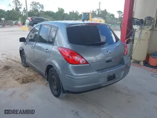 2011 Nissan Versa 1.8 SL with VIN 3N1BC1CP7BL446671, listed as a IAAI auction lot 42003858 with 96,939 mi miles. Bid and sale history available at carsss.com. Image 3.