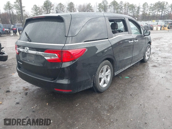 2019 Honda Odyssey EX-L with VIN 5FNRL6H76KB116195, listed as a IAAI auction lot 41078250 with 106,922 mi miles. Bid and sale history available at carsss.com. Image 4.