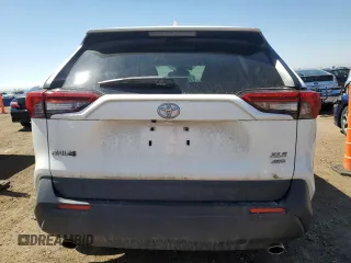 2019 Toyota RAV4 XLE with VIN JTMP1RFVXKD021338, listed as a Copart auction lot 52578515 with 41,327 mi miles and Salvage Title. Bid and sale history available at DreamBid. Image 6.