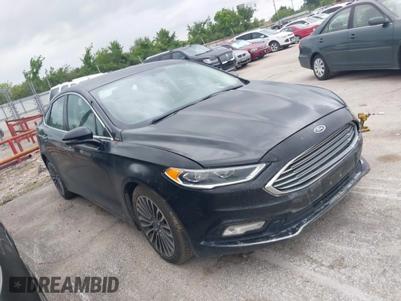 2017 Ford Fusion Titanium with VIN 3FA6P0K9XHR118057, listed as a IAAI auction lot 41982261 with 151,704 mi miles. Bid and sale history available at carsss.com. Image 1.
