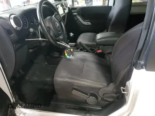 2013 Jeep Wrangler Rubicon 10th Anniversary z VIN 1C4BJWCGXDL543958, wystawiony jako Copart lot #58492255 z przebiegiem 94 455 mil mil oraz Szkoda całkowita • Salvage title. Historia ofert i sprzedaży dostępna na DreamBid. Obrazek 7.
