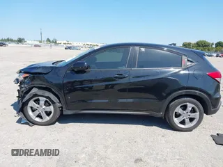 2021 Honda HR-V LX with VIN 3CZRU5H34MM726934, listed as a IAAI auction lot 41797859 with 139,927 mi miles. Bid and sale history available at carsss.com. Image 15.