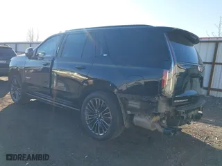 2023 Cadillac Escalade AWD V-Series with VIN 1GYS4HK97PR453426, listed as a IAAI auction lot 41411066 with 13,764 mi miles. Bid and sale history available at carsss.com. Image 3.