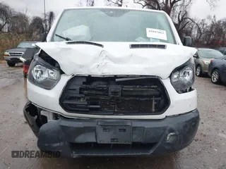2017 Ford Transit z VIN 1FTYR1ZM2HKA27107, wystawiony jako IAAI lot #41047863 z przebiegiem 87 219 mil mil oraz . Historia ofert i sprzedaży dostępna na DreamBid. Obrazek 6.