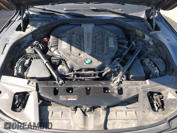 2013 BMW 7 Series 750Li xDrive z VIN WBAYF8C58DD141658, wystawiony jako IAAI lot #42327776 z przebiegiem 130 428 mil mil oraz . Historia ofert i sprzedaży dostępna na DreamBid. Obrazek 10.