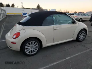 2009 Volkswagen Beetle S with VIN 3VWRF31Y29M409328, listed as a Copart auction lot 87849455 with 69,693 mi miles and Salvage title. Bid and sale history available at DreamBid. Image 3.