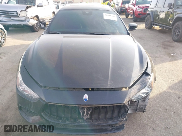 2021 Maserati Ghibli S with VIN ZAM57YSA3M1365483, listed as a IAAI auction lot 41488486 with 51,954 mi miles and . Bid and sale history available at DreamBid. Image 12.