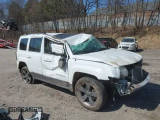 2015 Jeep Patriot High Altitude with VIN 1C4NJRFB1FD340159, listed as a IAAI auction lot 41769322 with 151,881 mi miles and . Bid and sale history available at carsss.com. Image 1.