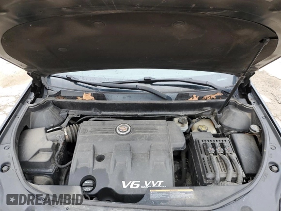 2012 Cadillac SRX Premium Collection z VIN 3GYFNFE37CS583580, wystawiony jako Copart lot #48160185 z przebiegiem 125 452 mil mil oraz Szkoda całkowita • Salvage title. Historia ofert i sprzedaży dostępna na DreamBid. Obrazek 14.