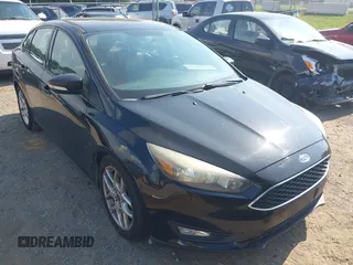 2015 Ford Focus SE z VIN 1FADP3F25FL284097, wystawiony jako IAAI lot #42553323 z przebiegiem 139 647 mil mil oraz . Historia ofert i sprzedaży dostępna na DreamBid. Obrazek 6.