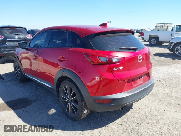 2016 Mazda CX-3 Grand Touring with VIN JM1DKBD71G0112329, listed as a IAAI auction lot 41662610 with 145,329 mi miles. Bid and sale history available at carsss.com. Image 3.