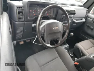 2006 Jeep Wrangler X with VIN 1J4FA39SX6P719070, listed as a Copart auction lot 55598455 with 110,741 mi miles and Salvage title. Bid and sale history available at DreamBid. Image 8.