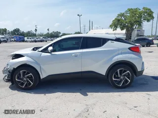 2022 Toyota C-HR XLE with VIN NMTKHMBX8NR147317, listed as a IAAI auction lot 41969293 with 11,621 mi miles. Bid and sale history available at carsss.com. Image 14.