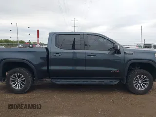 2021 GMC Sierra 1500 AT4 with VIN 1GTP9EED8MZ391803, listed as a IAAI auction lot 41275238 with 84,024 mi miles. Bid and sale history available at carsss.com. Image 14.